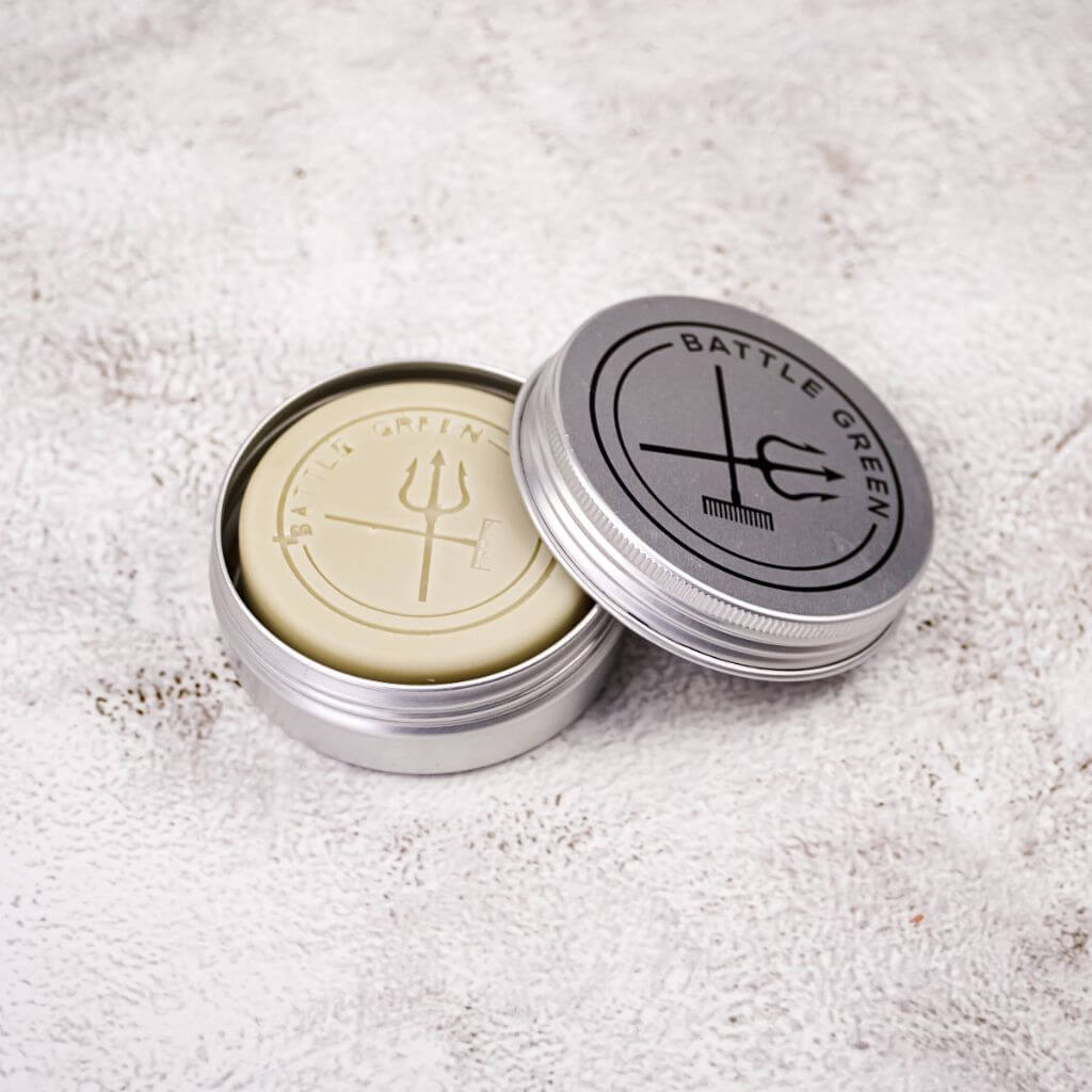 Battle Green Mint Conditioner Bar, with the bar in the travel tin. House your conditioner bar in this handy Travel Tin to keep your bar dry, protected and hygienic.