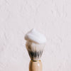 Acala Natural Shaving Brush being used with shaving foam. white background. economy priced.