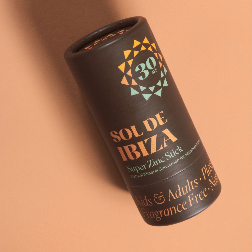 Sol de Ibiza Face & Body Plastic Free Zinc Stick SPF30 Sun screen. Cardboard tube. Natural, recyclable, vegan, cruelty free sun protection for all skin types, adults and children. flatlay outside image.