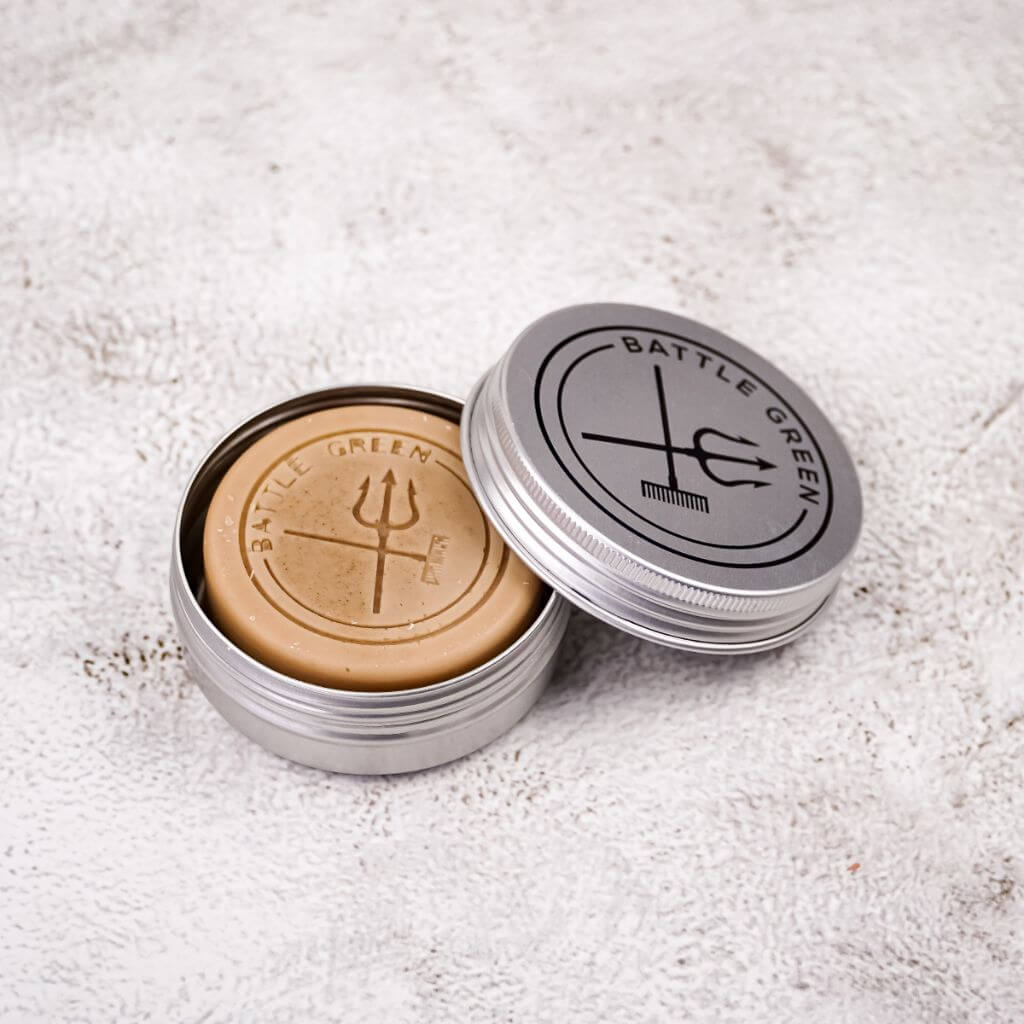 Battle Green Fragrance Free Chamomile Conditioner Bar. with the bar in the travel tin. House your conditioner bar in this handy Travel Tin to keep your bar dry, protected and hygienic.