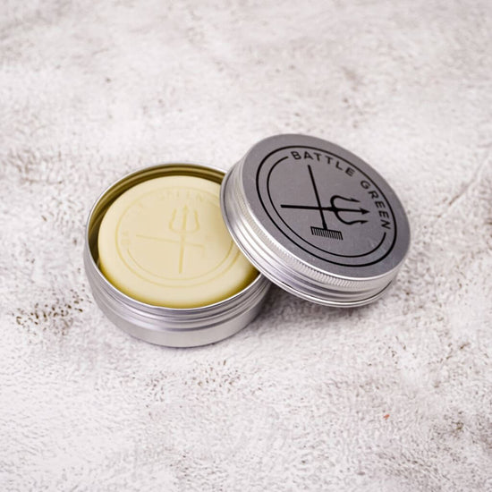 Battle Green Citrus Solid Hair Conditioner Bar. with the bar in the travel tin. House your conditioner bar in this handy Travel Tin to keep your bar dry, protected and hygienic.