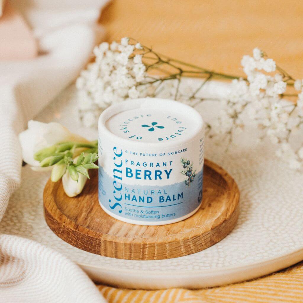 Scence Fragrant Berry Natural Solid Hand Balm. Lifestyle image. Size 40 grams. Easily stored in a handbag.
