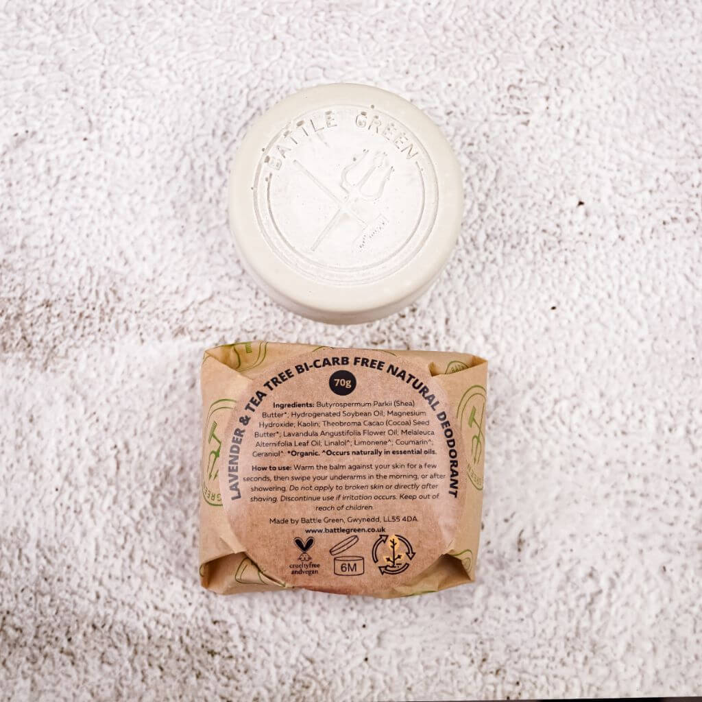 Battle Green Lavender & Tea Tree Vegan Natural Deodorant Bar. with biodegradable wrapping on show. bicarbonate of soda free. fragrance free.