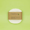 Flawless Professional Vegan Beauty Reusable Organic Cotton Makeup Remover Pads. Pack of face pads. On a green background.