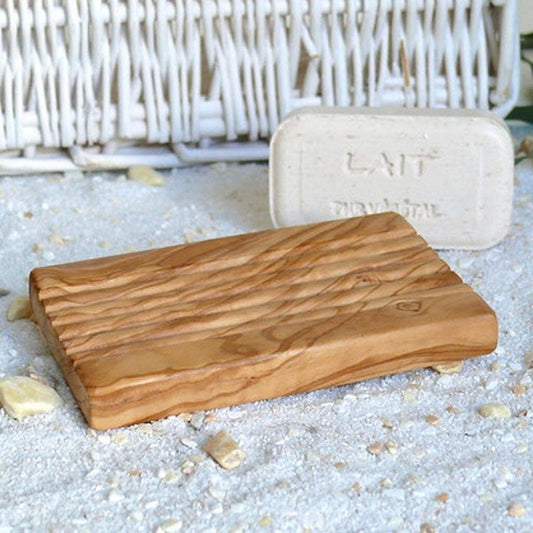 Olive wood grooved soap dish. Perfect for the bathroom basin. traditional and elegant. easily cleaned, and beautifully coloured.