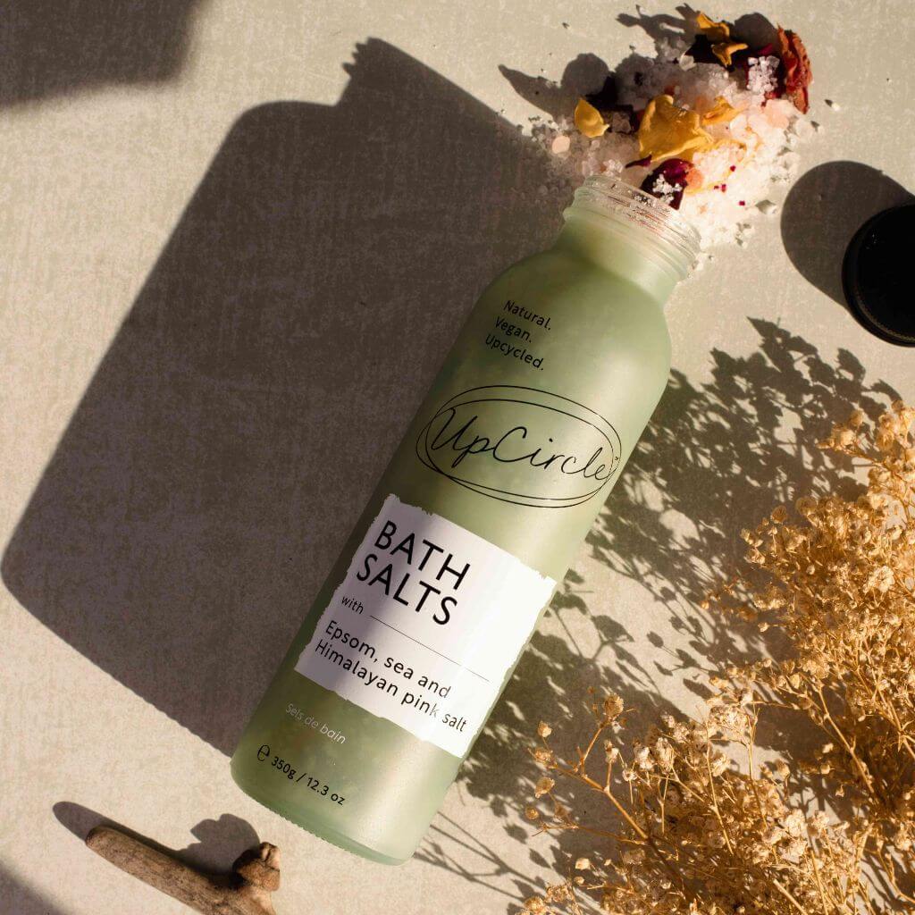 UpCircle Bath Salts with Epsom, Sea and Himalayan Pink Salt, and Rose Petals. Flatlay product image.