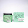 UpCircle - Body Cream with the extract of leftover date seeds. Green Glass Jar and Cardboard packaging showing the front.