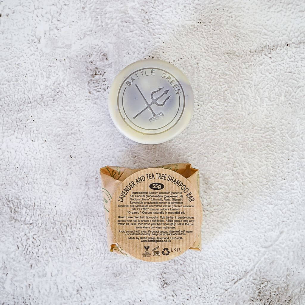 Battle Green Lavender & Tea Tree Natural Vegan Shampoo Bar. Lavender & Tea Tree. with wrapping. on display. 55g. up to 80 washes.