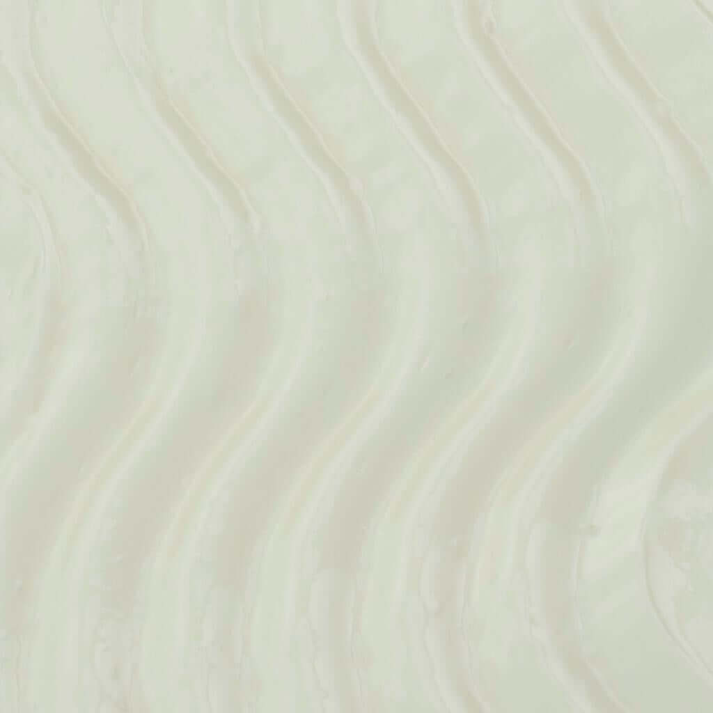 UpCircle - Body Cream texture photo shot. The product is white and thick.