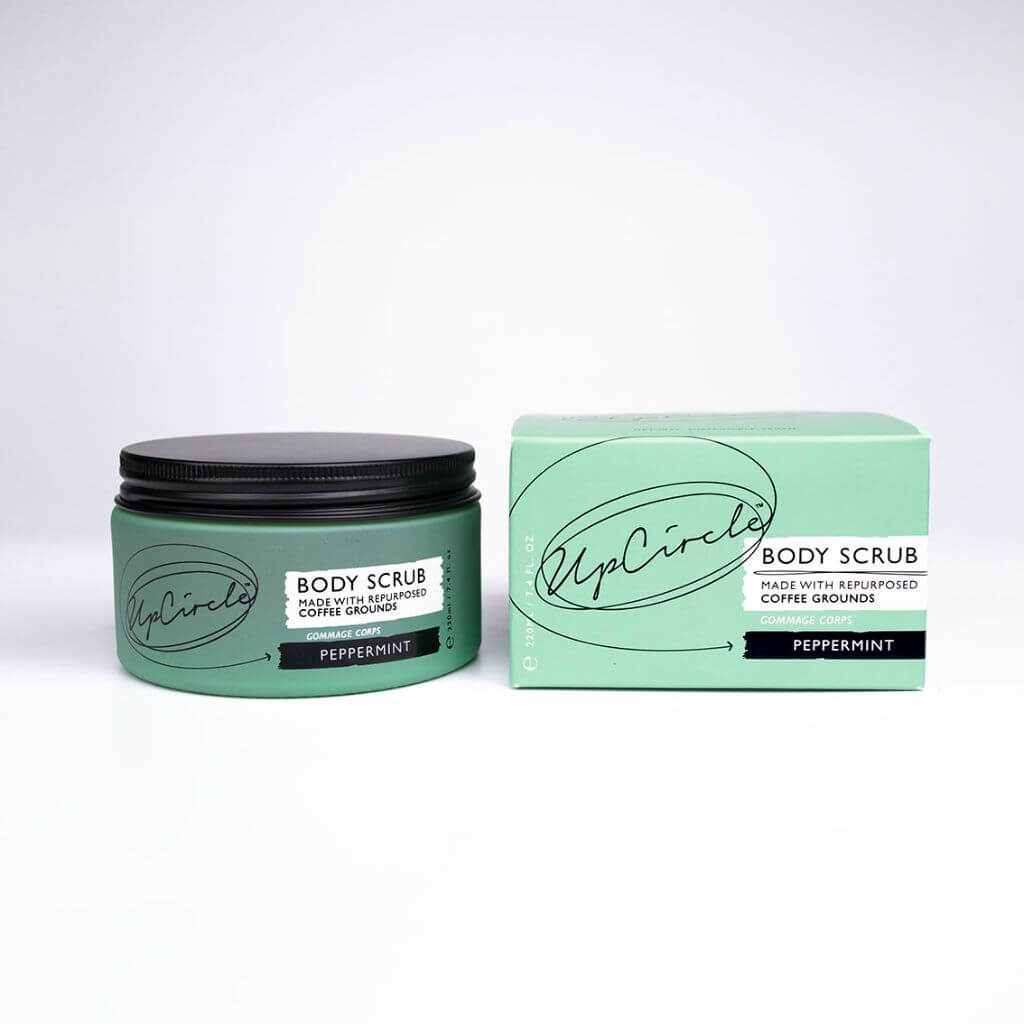 Upcircle Body Scrub containing Peppermint with lid on and cardboard recyclable box on a white background.