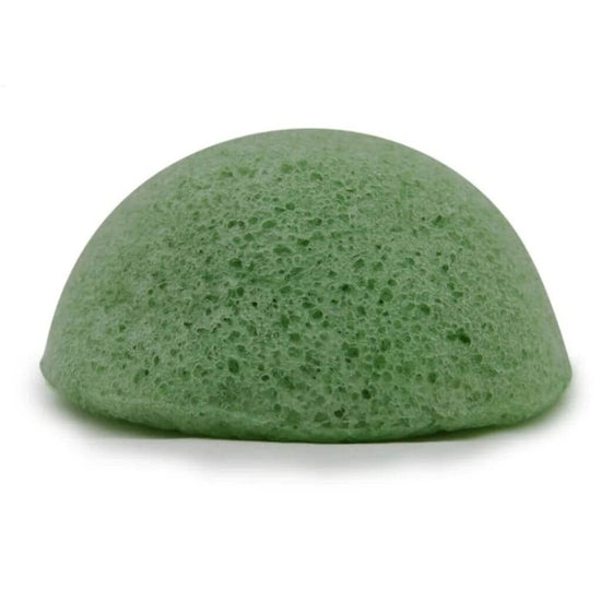  Acala Konjac Sponge with Green Tea boosting for use on face and body. Sponge on a white background. Sponge is green in colour.