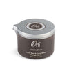 Orli Cocoa Bean Massage Candle in Aluminium tin. Luxury Shea & Cocoa Butter Massage Candle. White background.