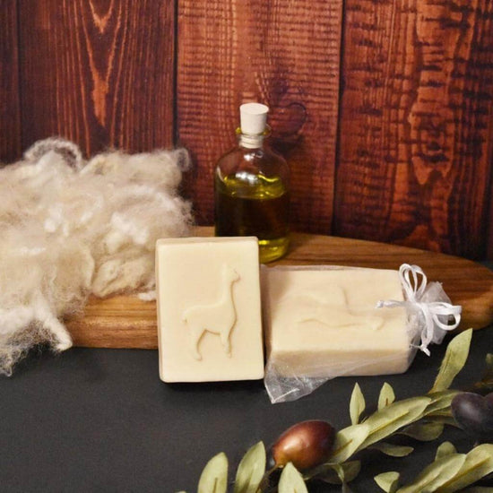 Goats of the Gorge. Alpaca Soap. Available in two varieties: Unscented and Lemon. Lifestyle Image with Alpaca Fleece.