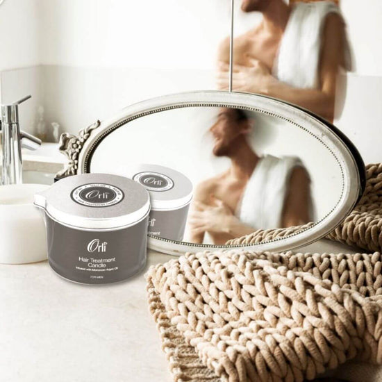  Orli Hair Treatment Candle - For Men in Aluminium tin. on display with other manly products. relax and restore your hair.