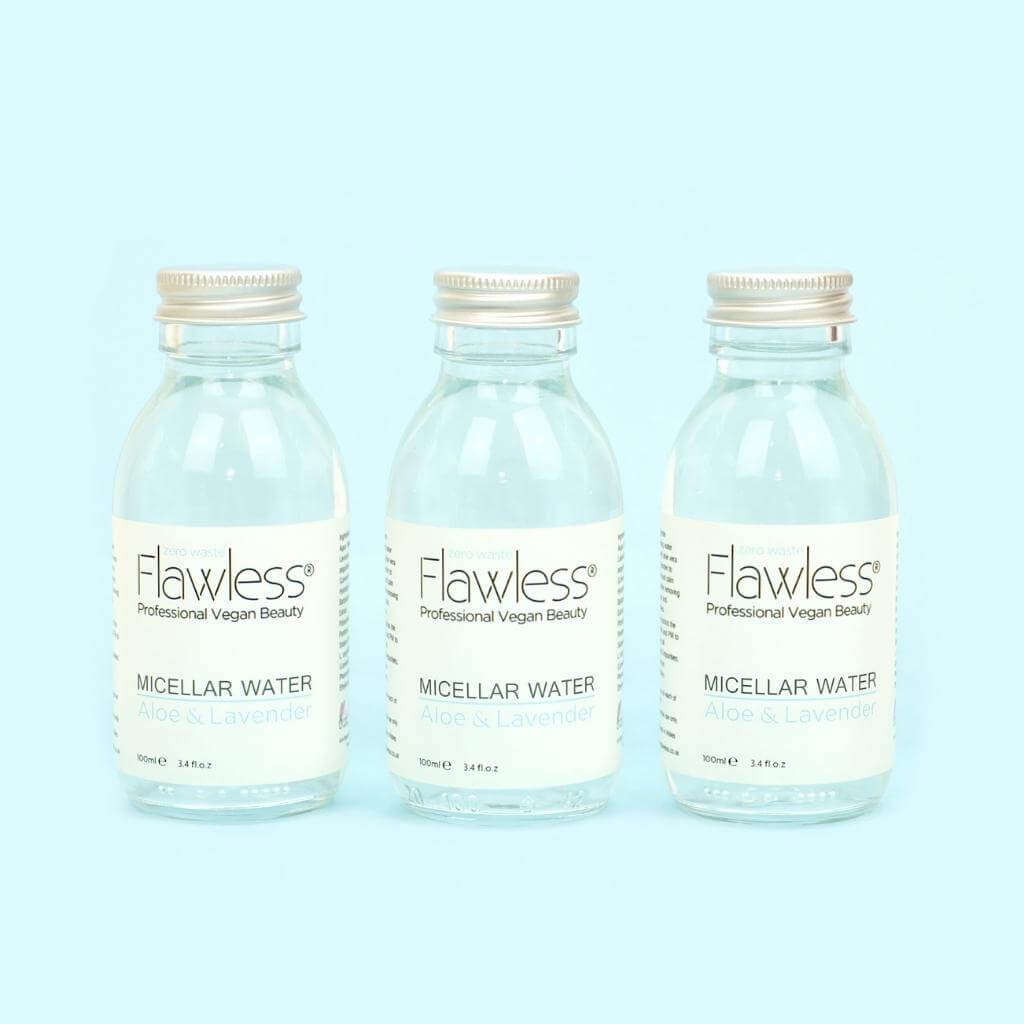 Flawless Professional Vegan Beauty Micellar Water - Aloe and Lavender. Glass jar three with aluminium lid on blue background.