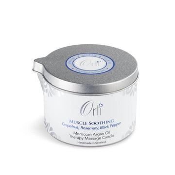 Orli Muscle Soothing Sports Massage Candle in Aluminium tin. Grapefruit, Rosemary, Black Pepper. Moroccan Argan Oil Therapy Massage Candle. Handmade in Scotland. White Background.