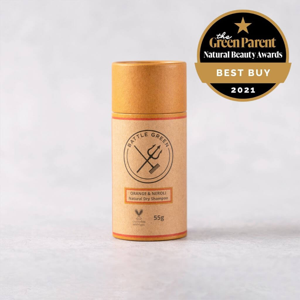 Battle Green Orange & Neroli Dry Shampoo Shaker Pot. On display with lid on and on a textured background. perfect gift for days between hair washes. with Award - Green Parent Natural Beauty Awards 2021 - Best Buy