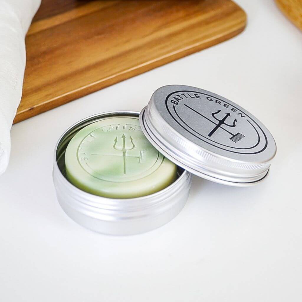 Battle Green Mint Natural Vegan Shampoo Bar. shampoo bar in travel tin on display. perfect fit for the travel tin, and to keep the shampoo safe and dry.