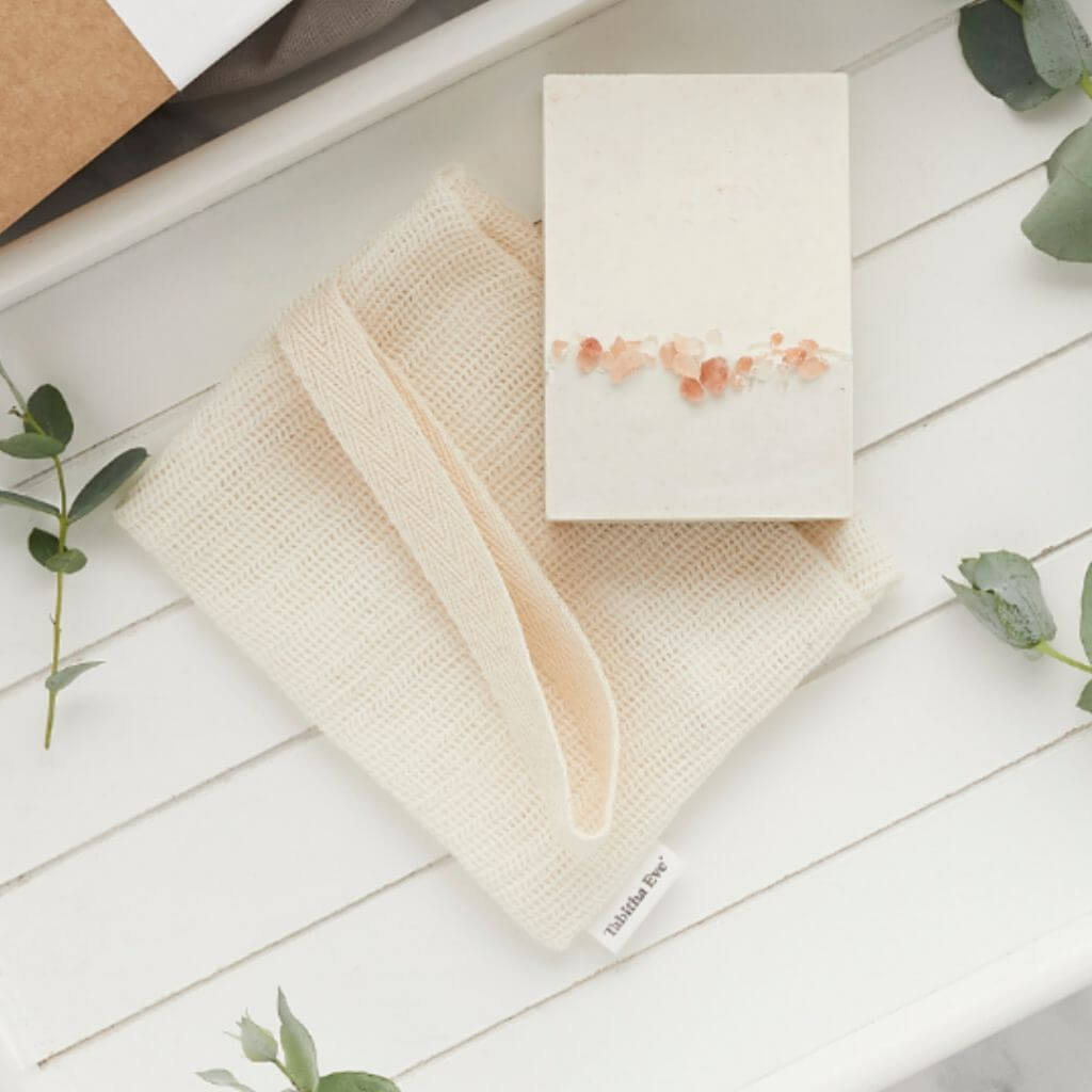 Tabitha Eve - Organic Cotton Soap Saver - on the table. Works great with soap and with shampoo bars
