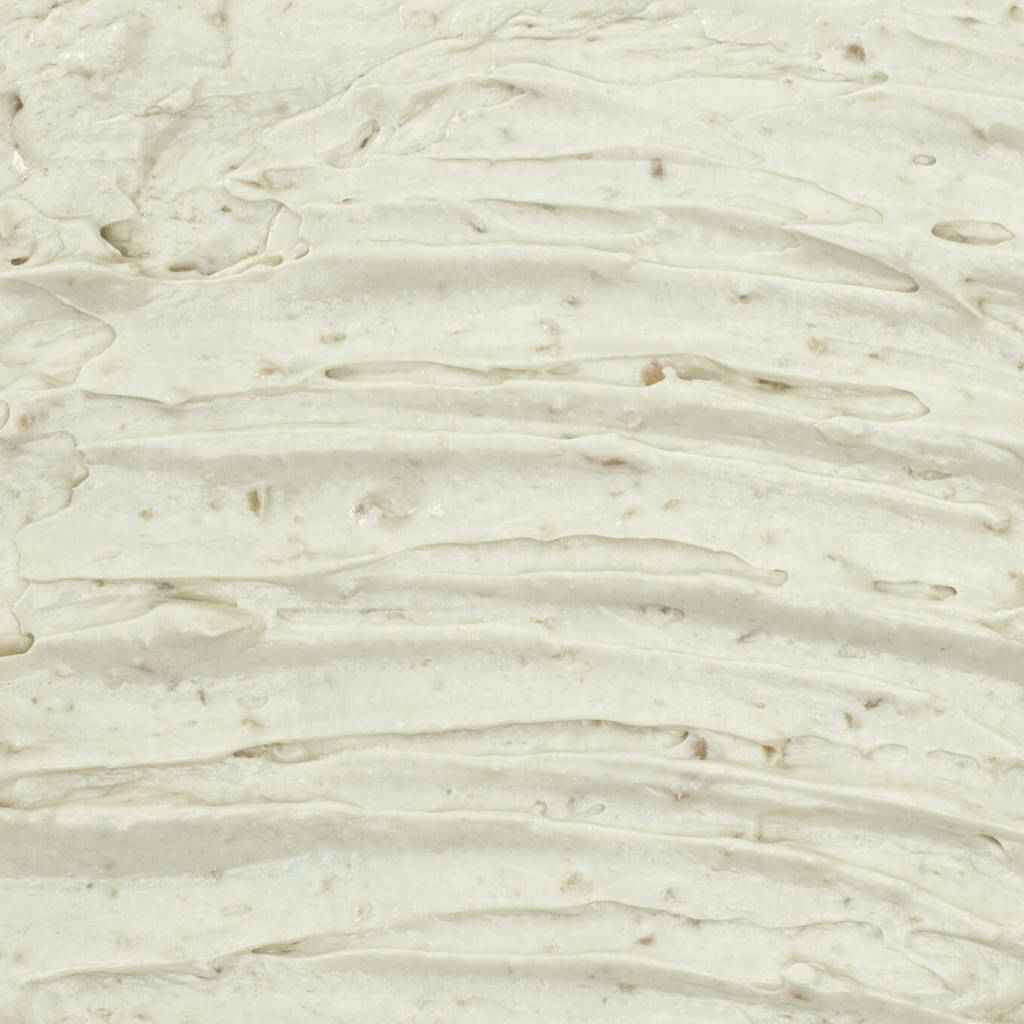 UpCircle - Kaolin Face Mask texture photo shot. The product is white, thick and creamy.