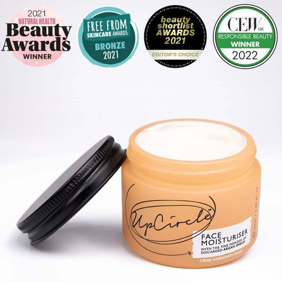 Upcircle Face Moisturiser jar with lid off and moisturising cream visible. Awards: 2021 Natural Health Beauty Awards Winner, Free From Skincare Awards Bronze 2021, Beauty shortlist awards 2021 Editors Choice.