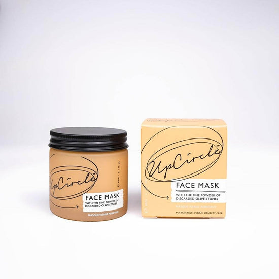 : UpCircle - Kaolin Face Mask with the Fine Powder of Discarded Olive Stones. Glass Jar and Cardboard Packaging displayed.
