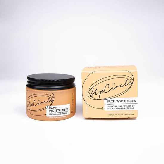 Upcircle Face Moisturiser with jar and box showing fronts. Face Moisturiser with the fine powder of discarded argan shells. Sustainable. Vegan. Cruelty-Free.