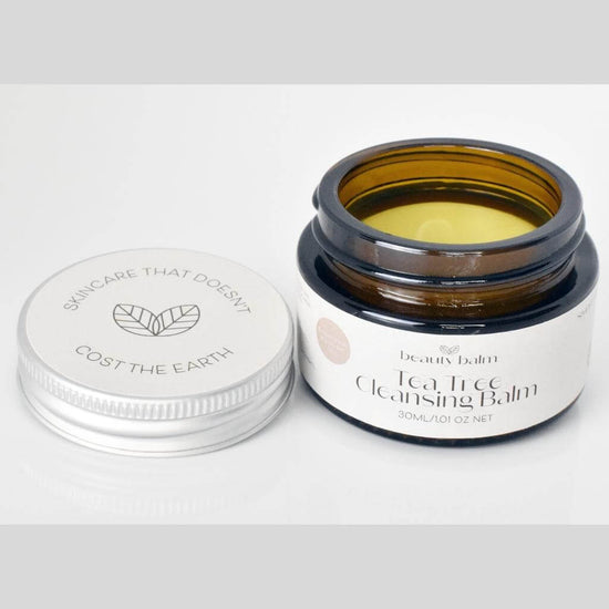 Beauty Balm Tea Tree Cleansing Balm. Lid Off. Product visible on white background. Use everyday and suitable on all skin types.