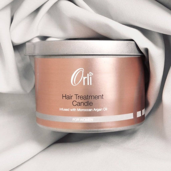 Orli Hair Treatment Candle - For Women in Aluminium tin. Display with natural cotton wrap. Vegan and cruelty free hair care treatment. Made in Scotland.